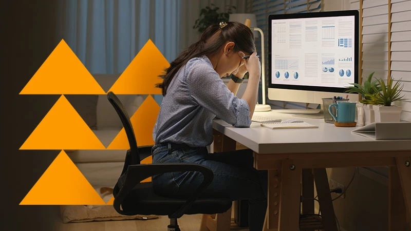 A woman reviewing information at a desk, with orange geometric branding.