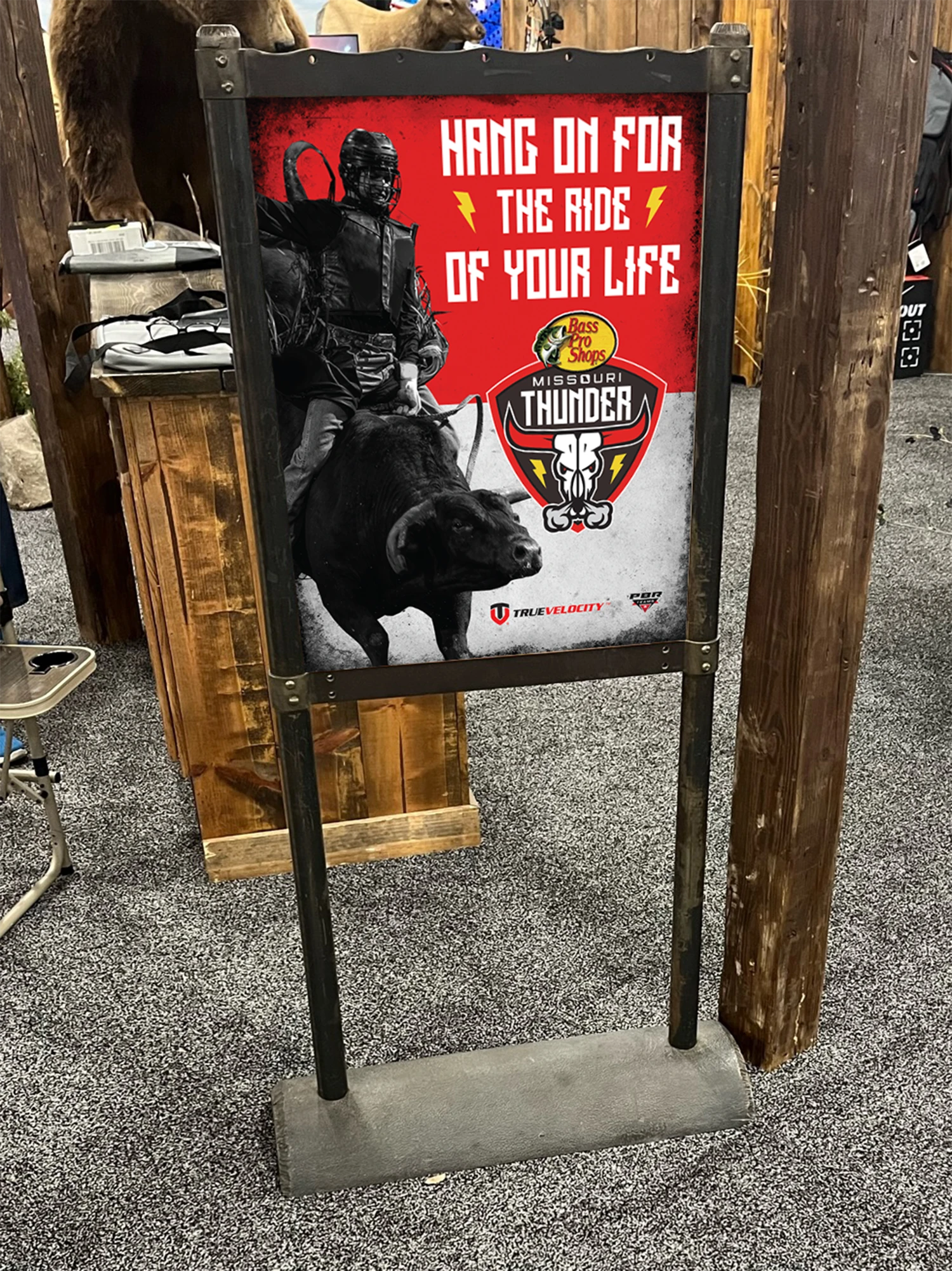 Missouri Thunder promotional sign installed beside a wooden fence.