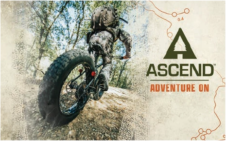 Ascend Adventure On in-store sign featuring a fat-tire bicycle on a wooded trail.