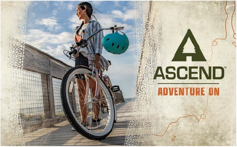 Ascend Adventure On in-store sign featuring a cruiser bicycle and rider near a bridge.