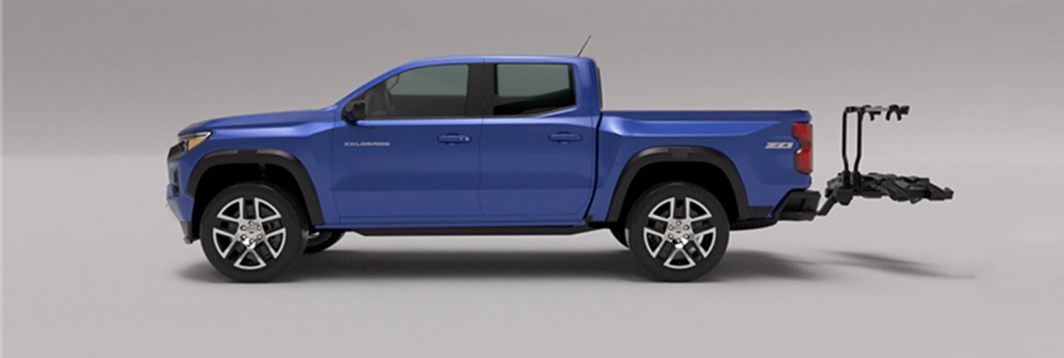 Wide side view of the blue pickup and bike rack combined in a 3D training render.